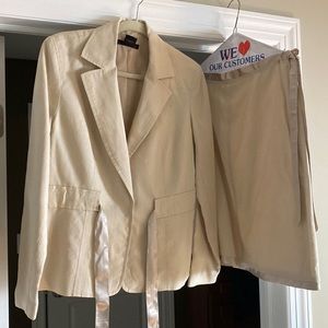 Two piece linen suit with satin detail.